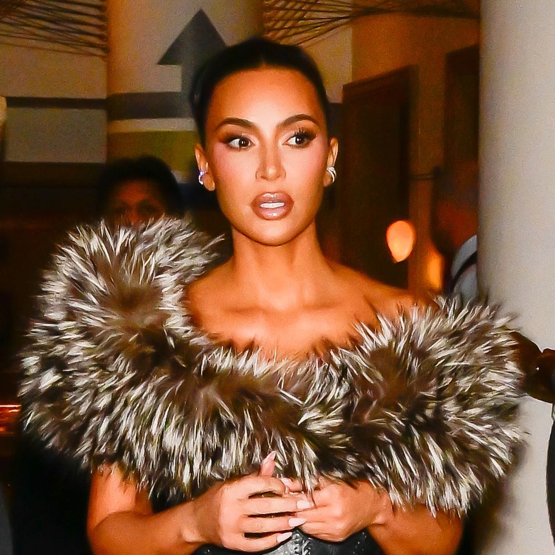 Kim Kardashian heats up ‘Kimsmas’ in a curve-hugging, cleavage-baring dress