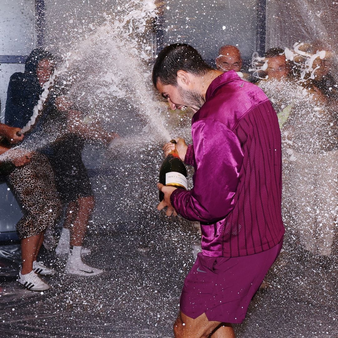 Carlos Alcaraz celebrates U.S. Open victory with tears, hugs, and a champagne shower