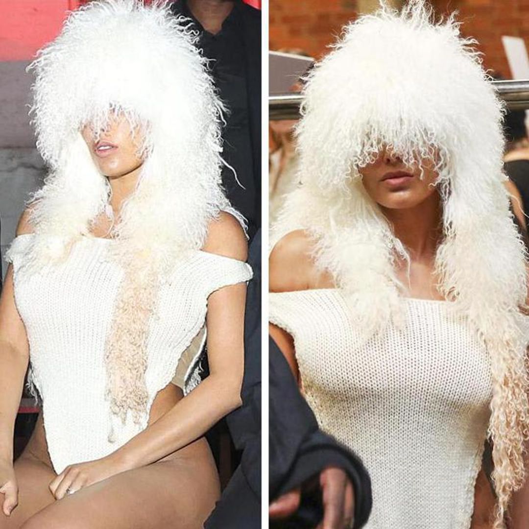 Bianca Censori shows off her curves in high-cut bodysuit and fluffy headpiece at London Fashion Week