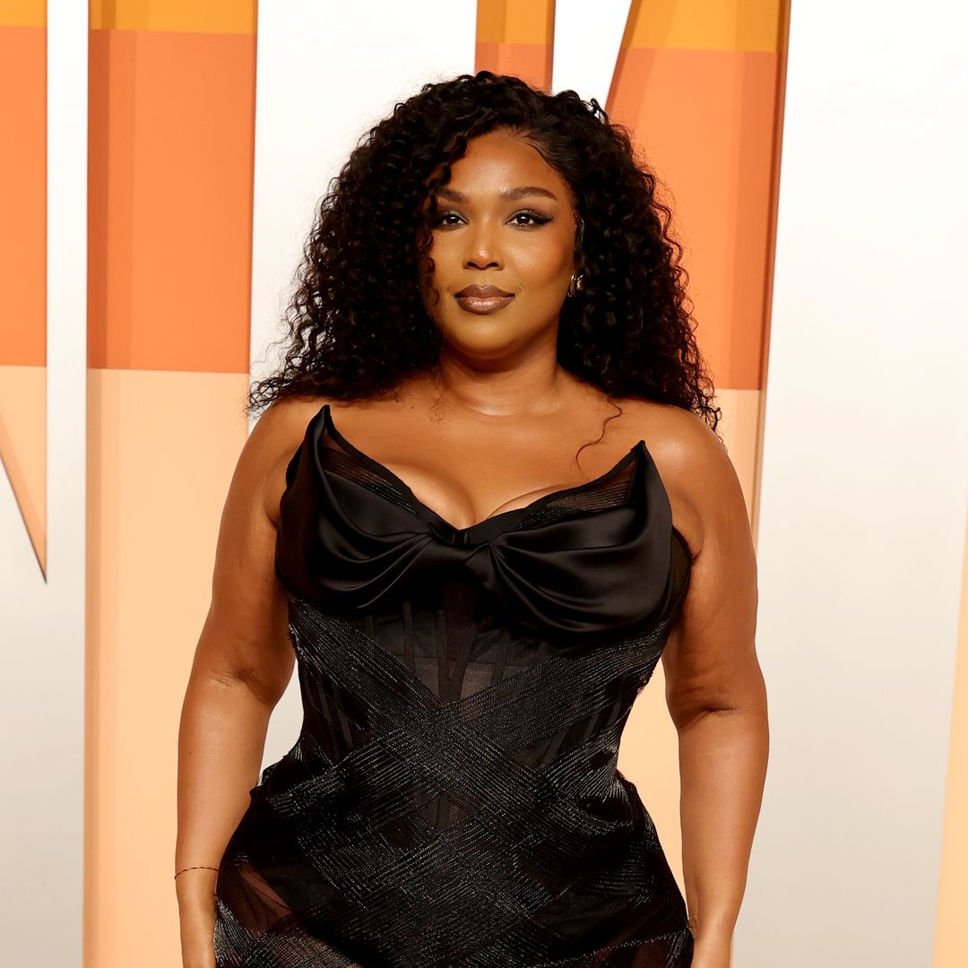 Lizzo shows off impressive weight loss transformation in black minidress and corset