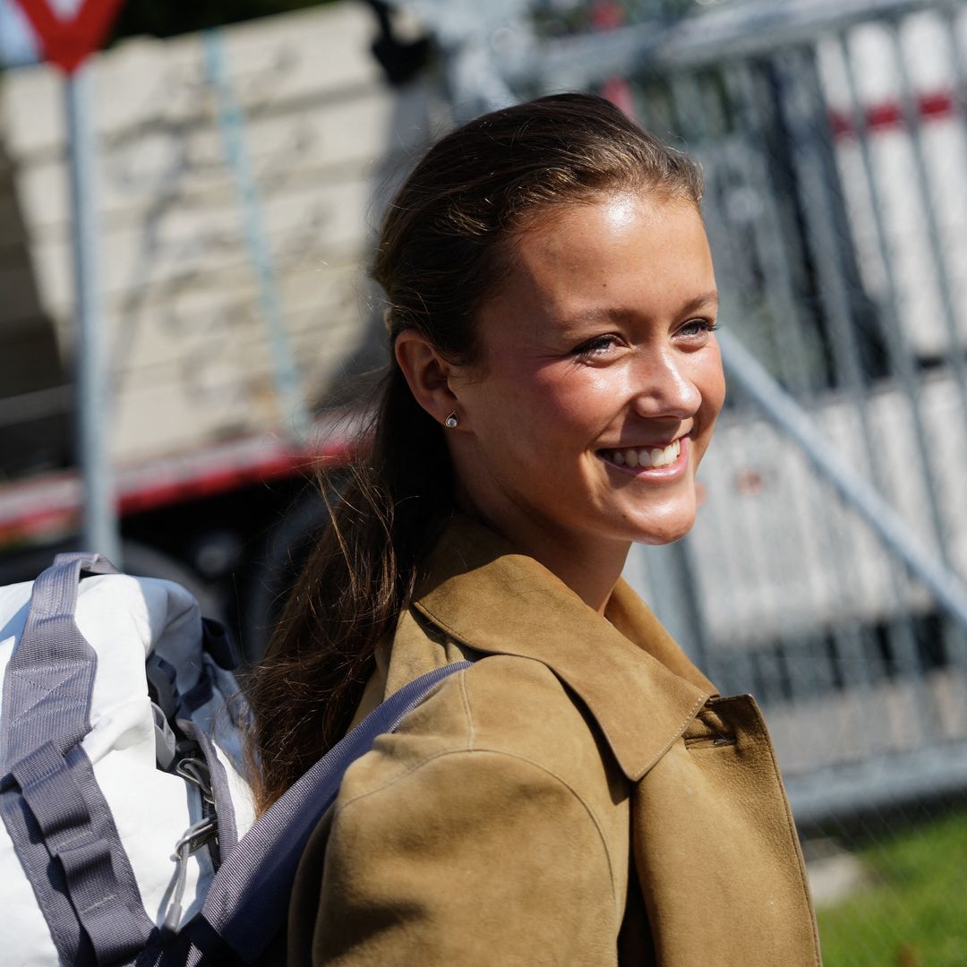 Princess Isabella of Denmark begins military service, arrives alone and smiling on day one