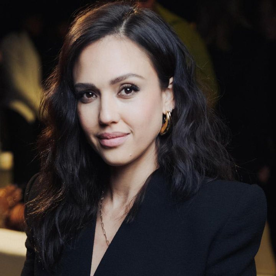 Jessica Alba channels 50s glamour in black minidress at Balmain fashion show in Paris