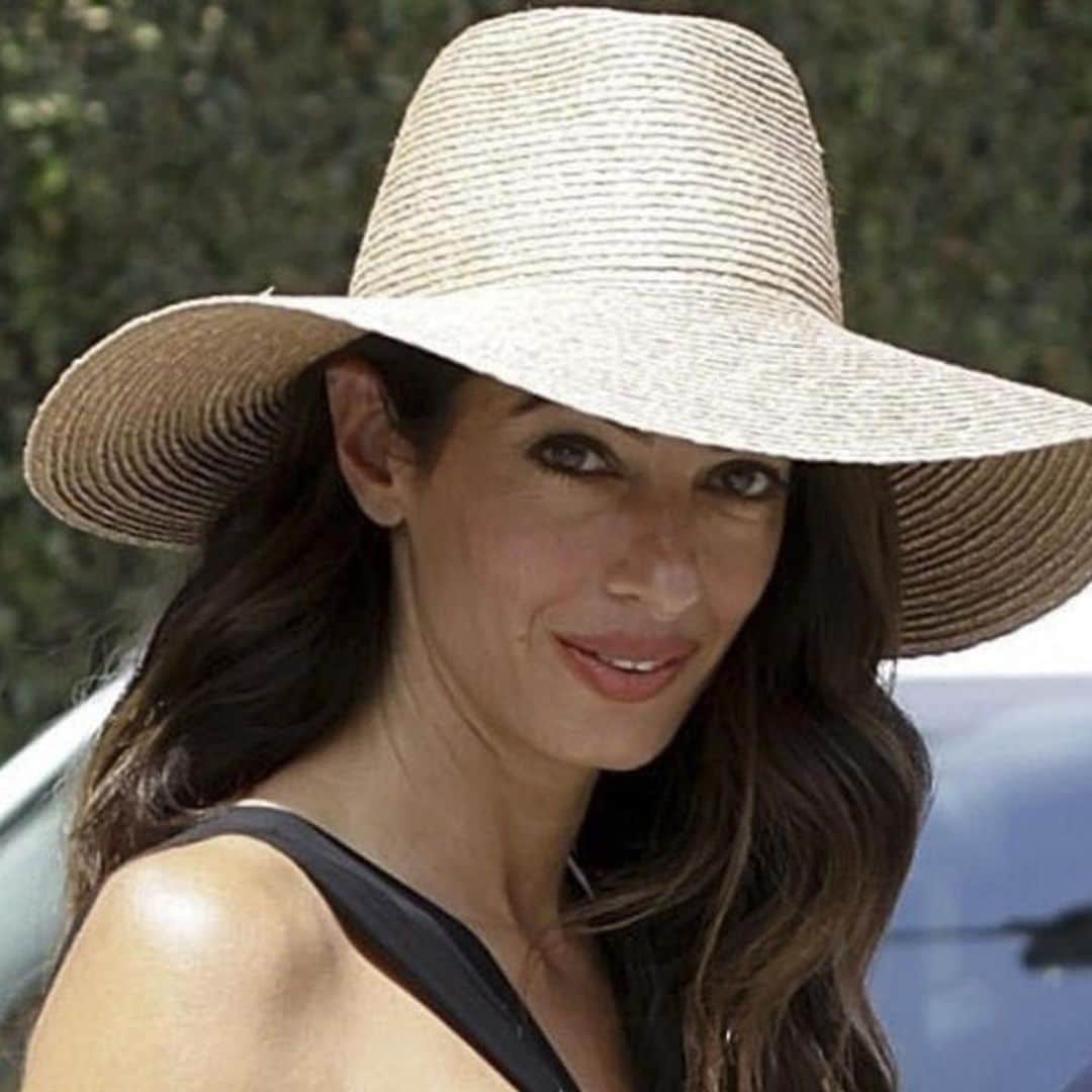 Amal Clooney looks effortlessly chic with her favorite summer accessory: See pics