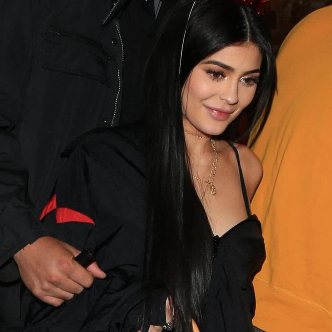 Kylie Jenner pairs brown stiletto nails with a $300K bag