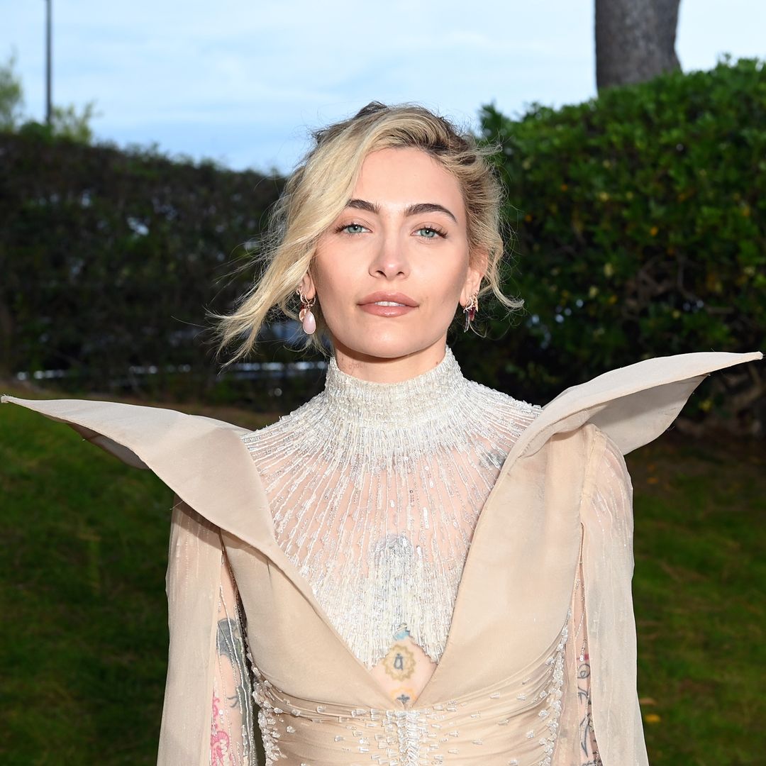 Paris Jackson poses in dramatic sheer gown at the amfAR Gala in Cannes
