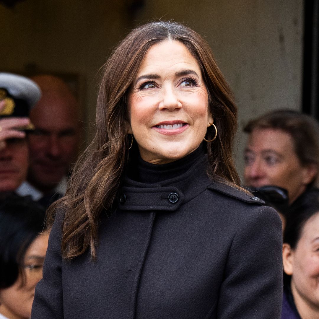 Queen Mary pulls a 20-year-old Prada coat out of her closet and gives it a bold new twist
