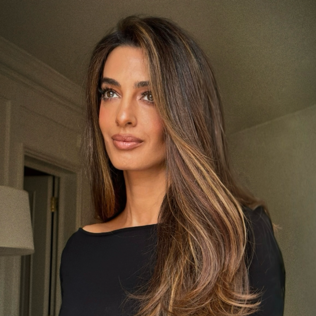 The highlights are bold enough to catch attention but blended seamlessly for a refined finish. This is luxury hair color at its most wearable.