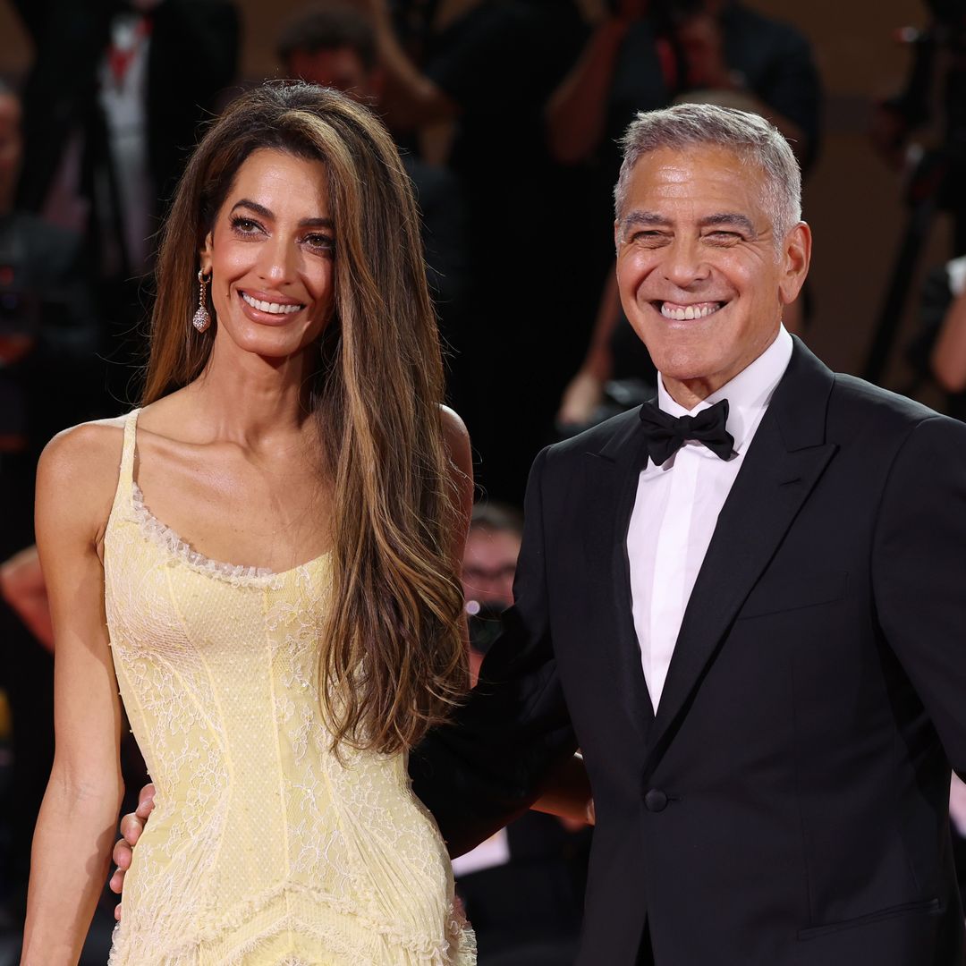 Amal Clooney shows off her summer style in cherry dress for date night with George Clooney