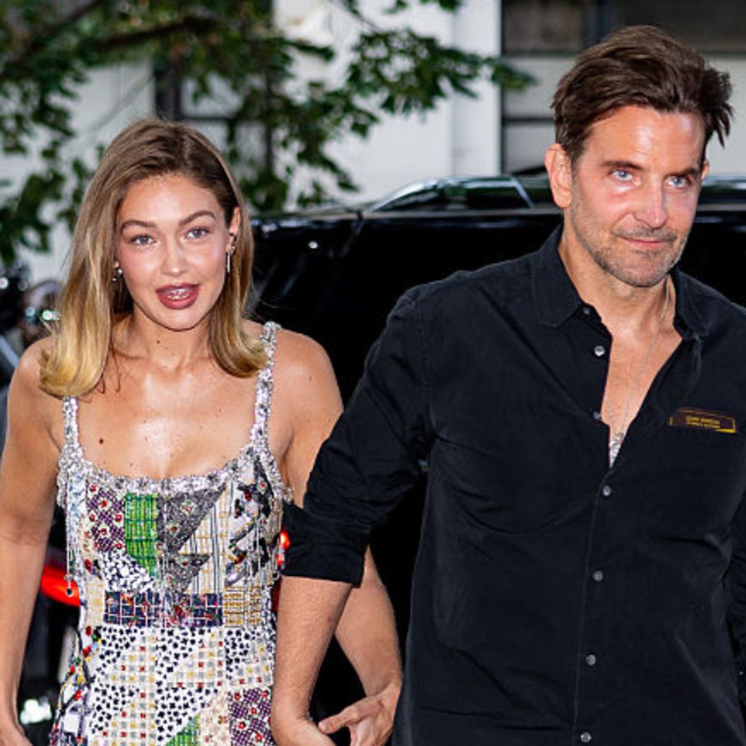 Gigi Hadid gives bridesmaid energy as she arrives at Taylor Swift’s wedding with Bradley Cooper