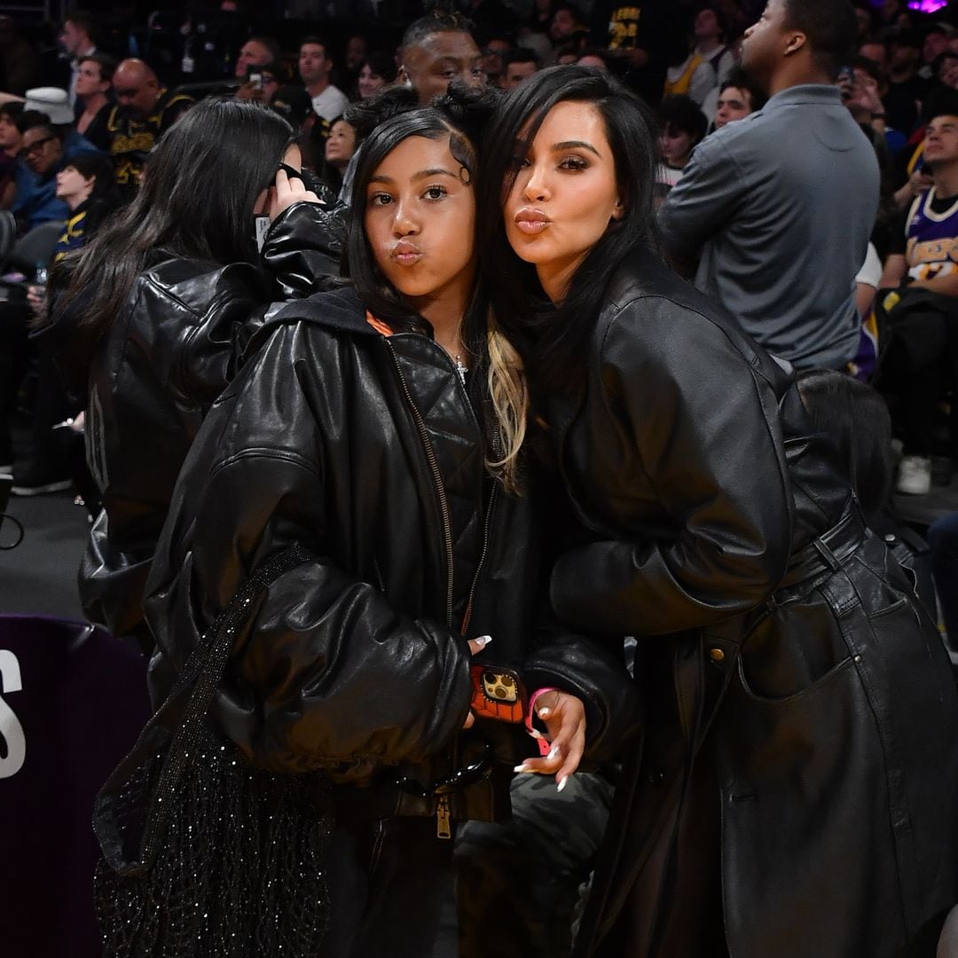 North West surprises followers with face tattoos, contact lenses, and bold braids