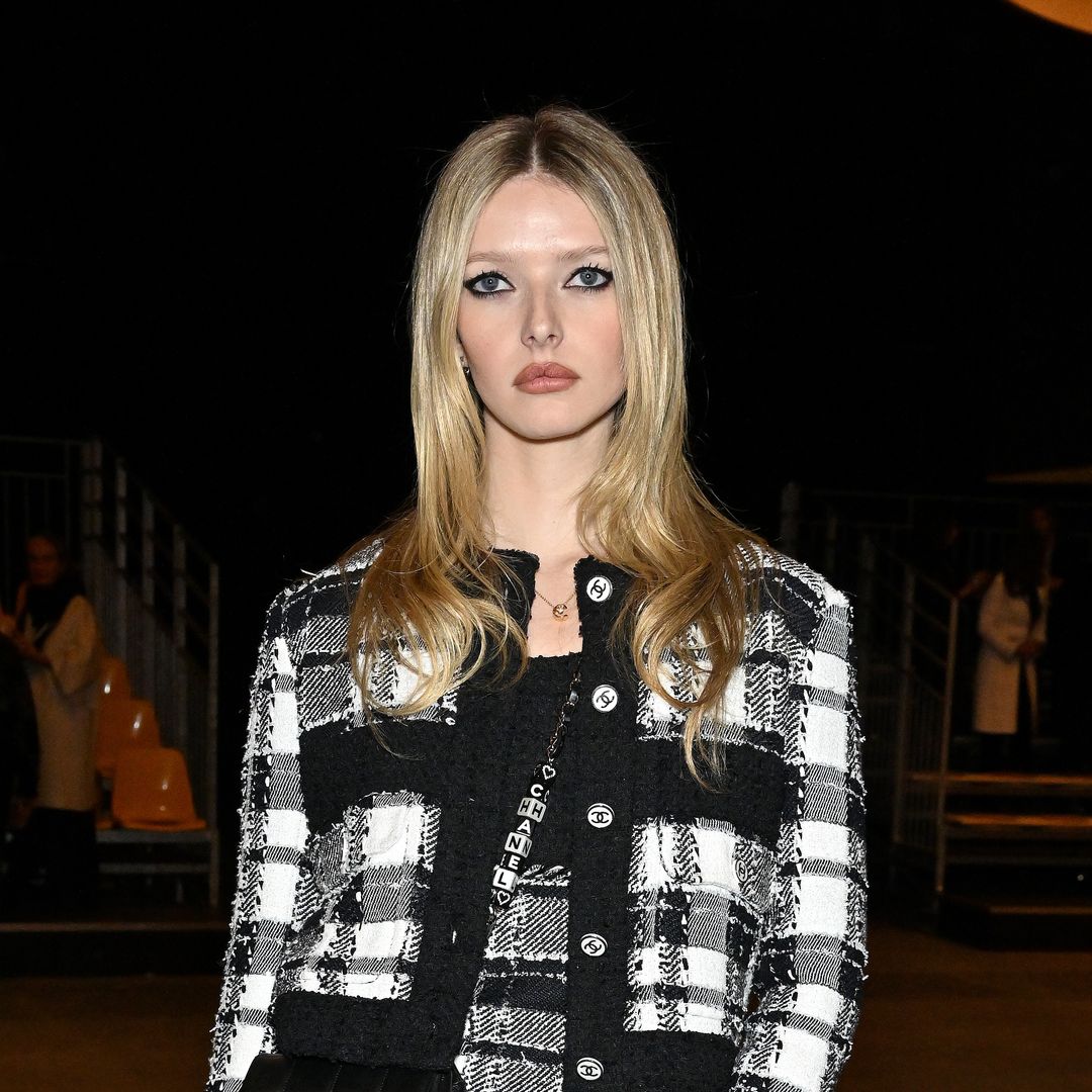 Apple Martin channels mom Gwyneth Paltrow in a candy stripe bikini