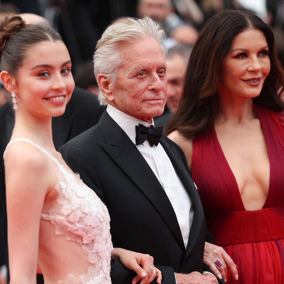 Catherine Zeta-Jones and Michael Douglas beam at their daughter Carys' graduation