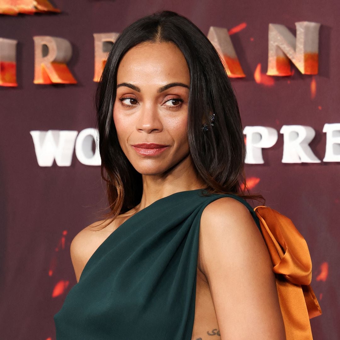 Zoe Saldaña turns up the heat in sultry high-slit dress at the ‘Avatar: Fire & Ash’ premiere