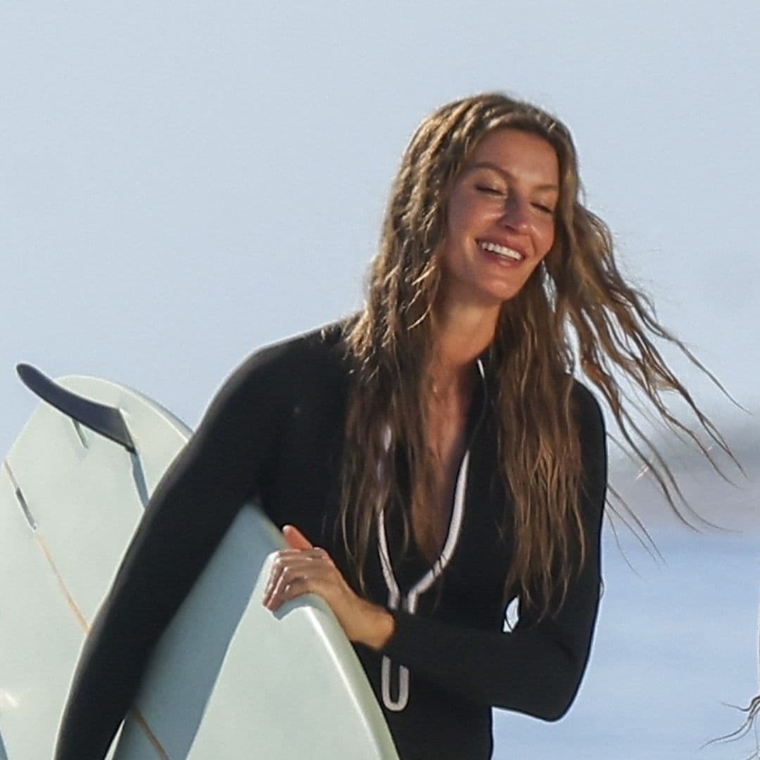 Gisele Bündchen sizzles in a wet, form-fitting wetsuit while surfing in Miami
