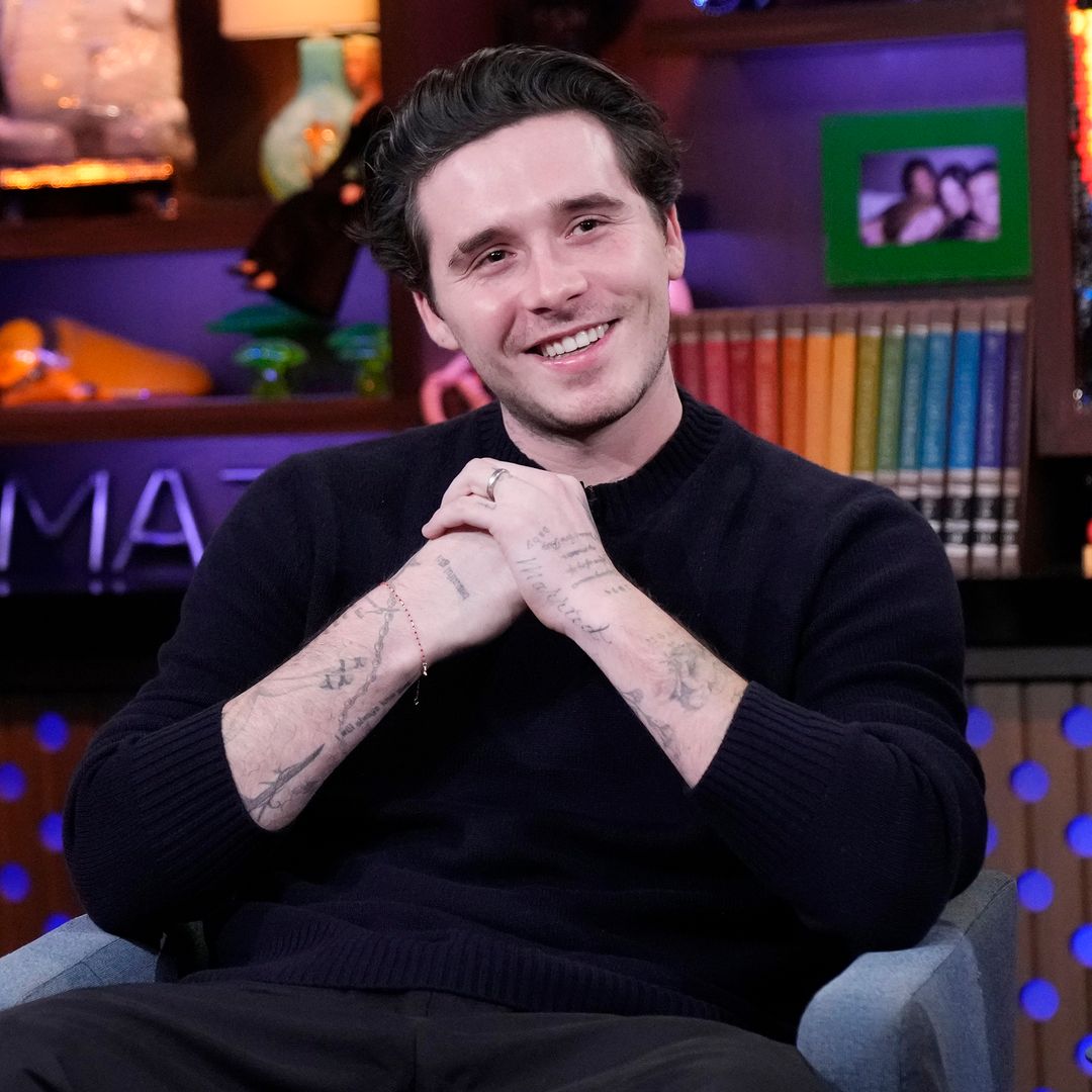 Brooklyn Beckham takes a spin on a vintage motorcycle as family drama escalates