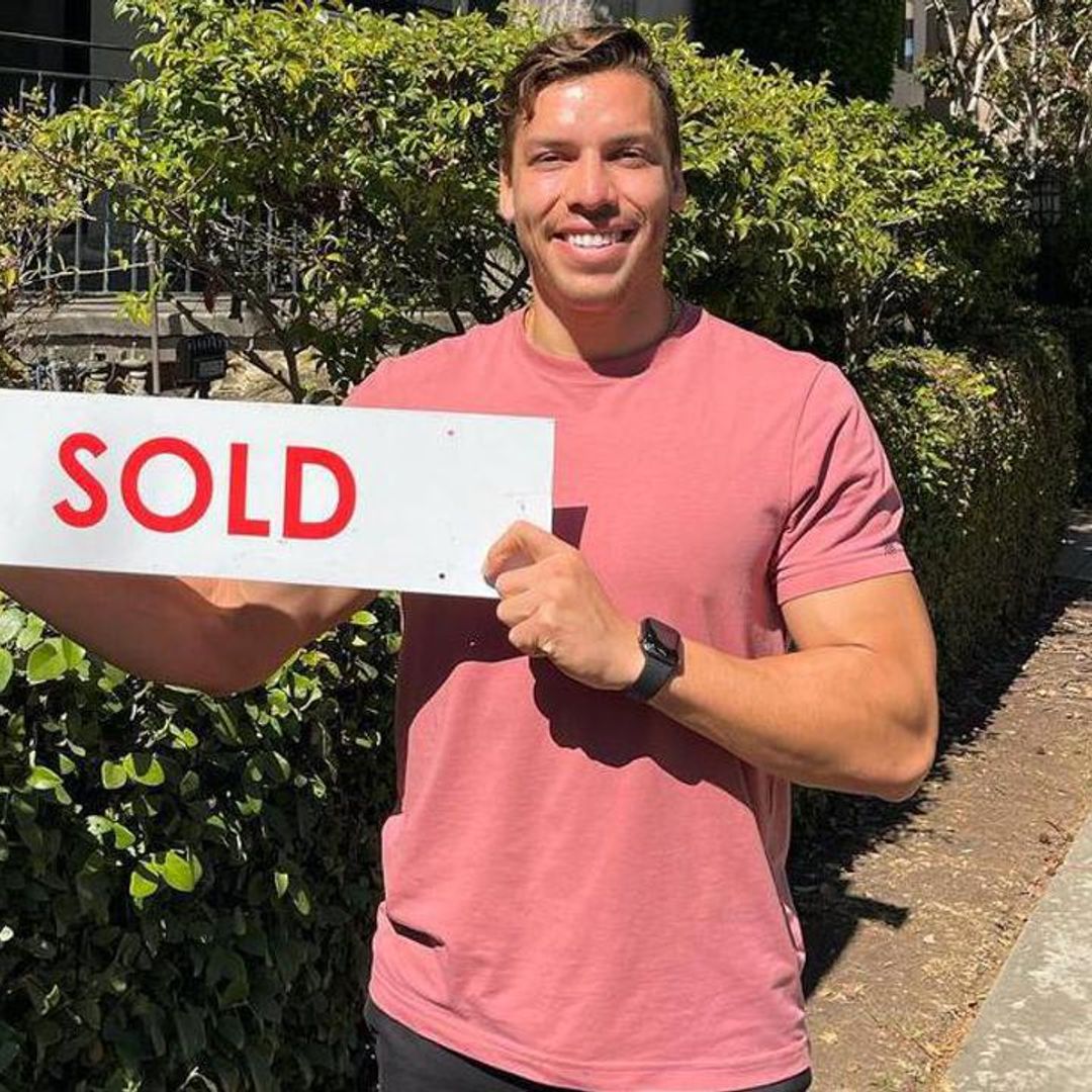 Joseph Baena celebrates his real estate success after selling a home