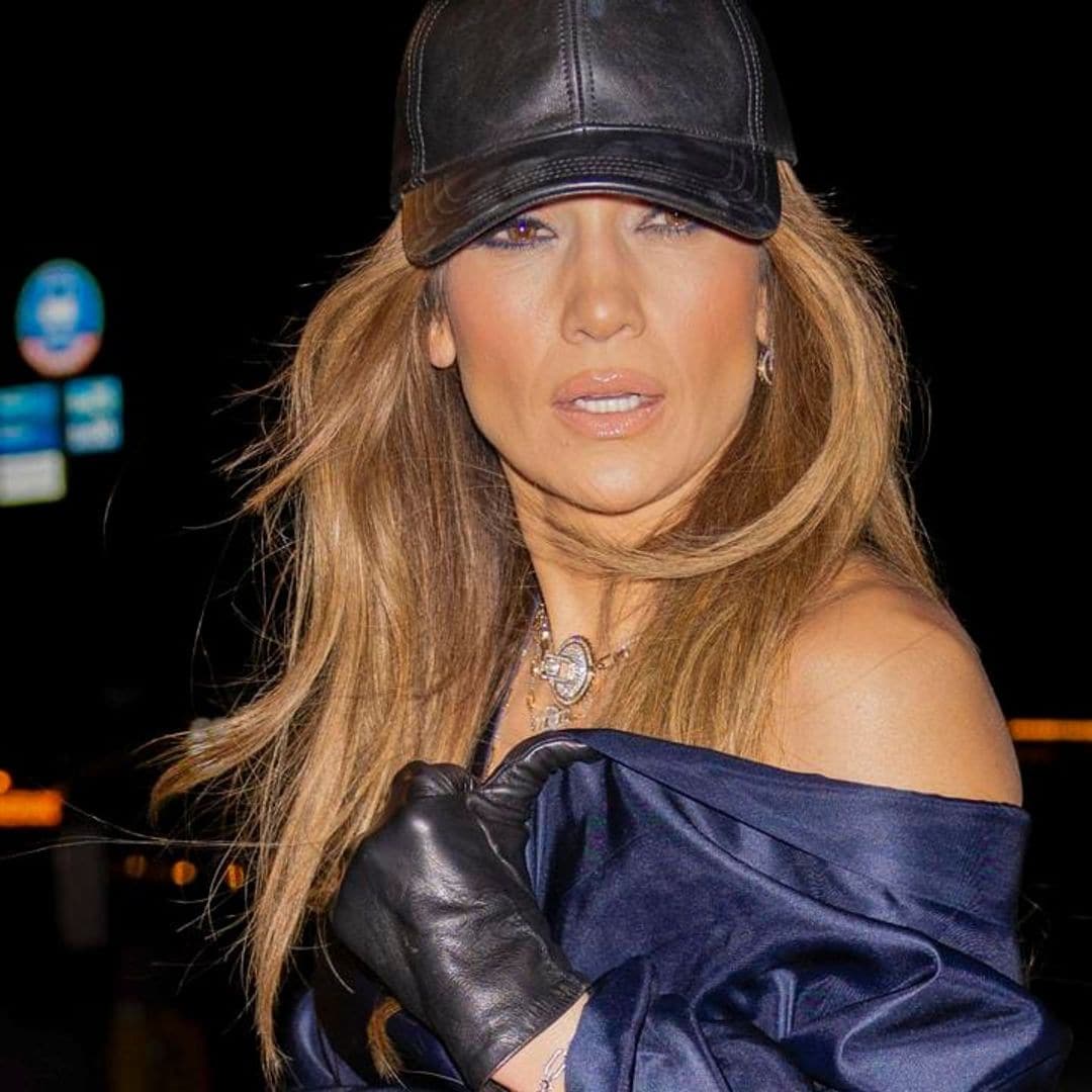 Jennifer Lopez wears dramatic satin jumpsuit and diamond necklace at The Bronx