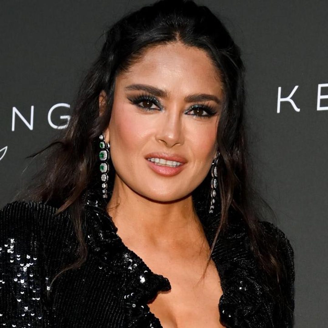 Salma Hayek poses in side-tie bikini during yacht outing