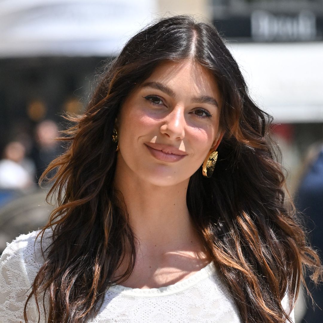 Camila Morrone steps out in white semi-sheer dress for Chanel's Haute Couture Show