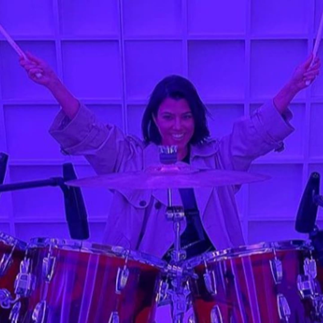 Kourtney Kardashian looks great playing the drums