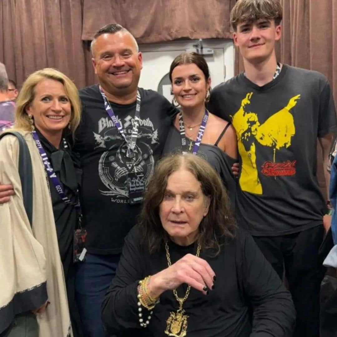 Louis, seen with his arms wrapped around his wife and kids during Ozzy's farewell concert