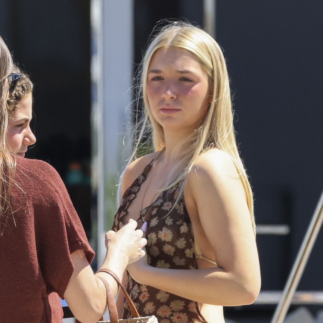 Harper Beckham borrows Victoria Beckham’s sheer floral dress during Ibiza getaway