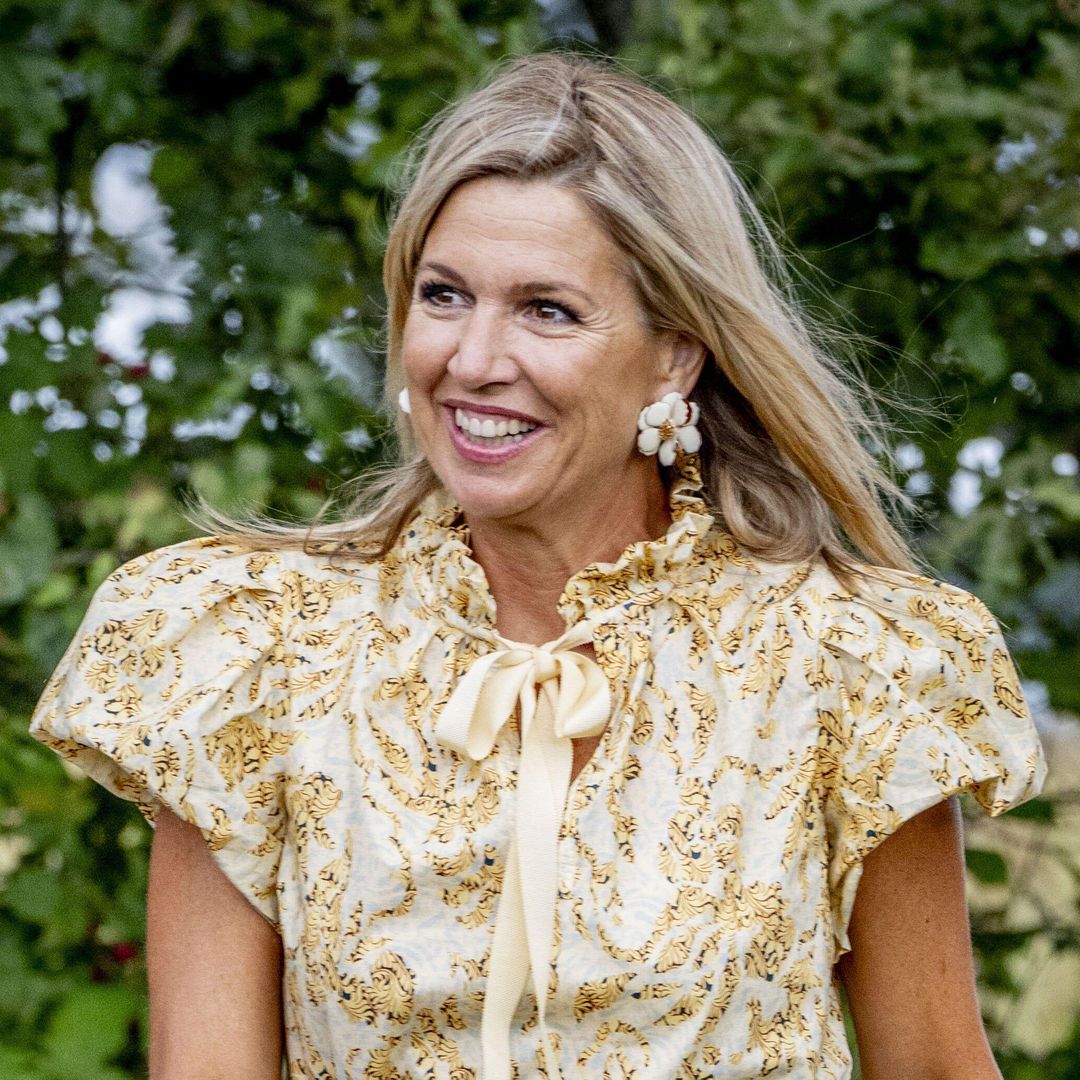 Queen Máxima gets behind the wheel of a tractor in glamorous royal look