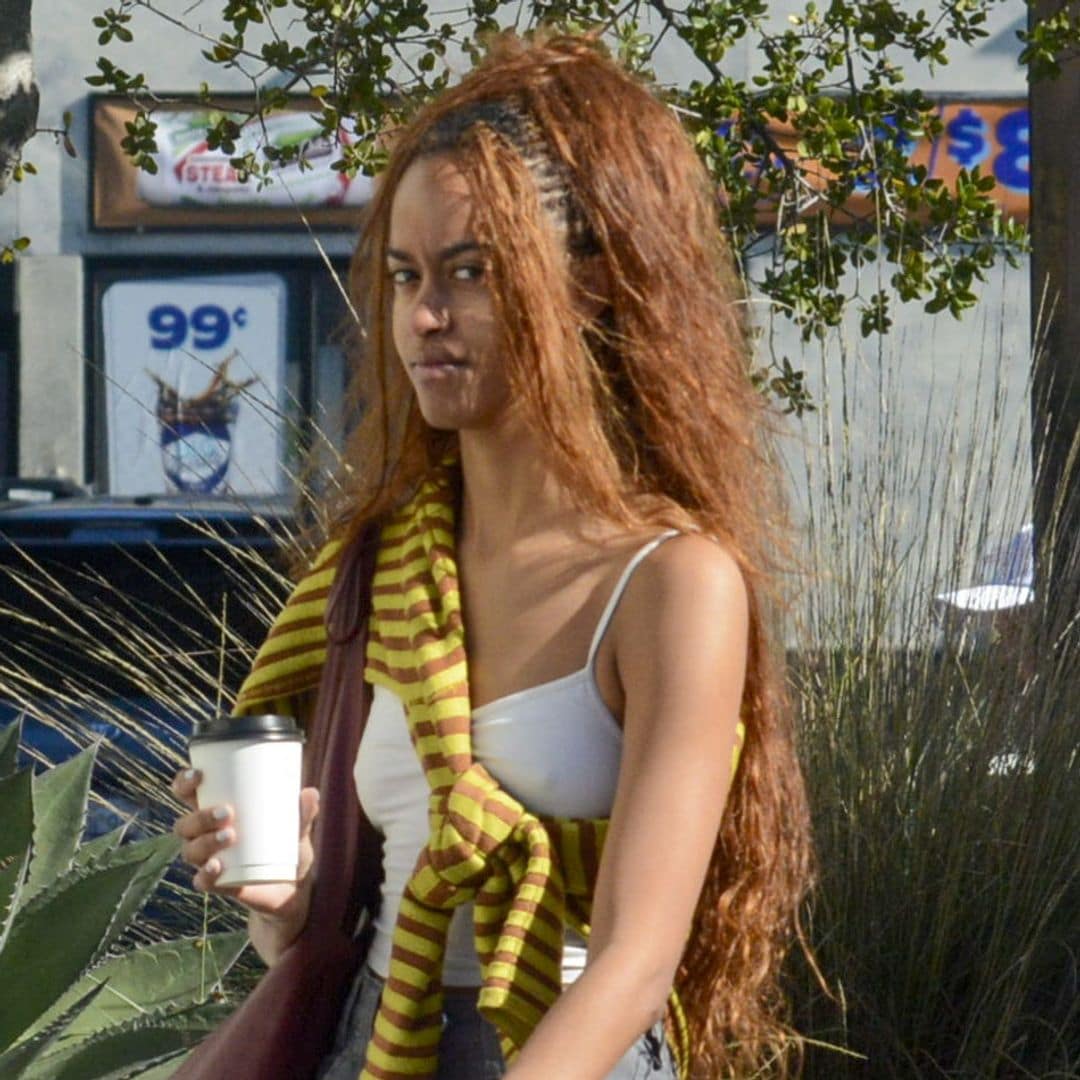 Malia Obama makes clogs cool with cropped pants and a colorful sweater