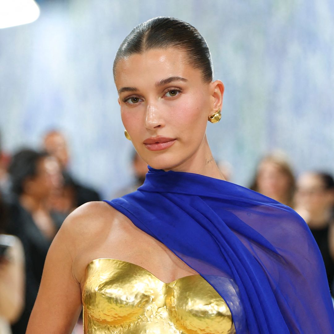 Hailey Bieber stuns in a string bikini and debuts a tattoo seemingly inspired by her son