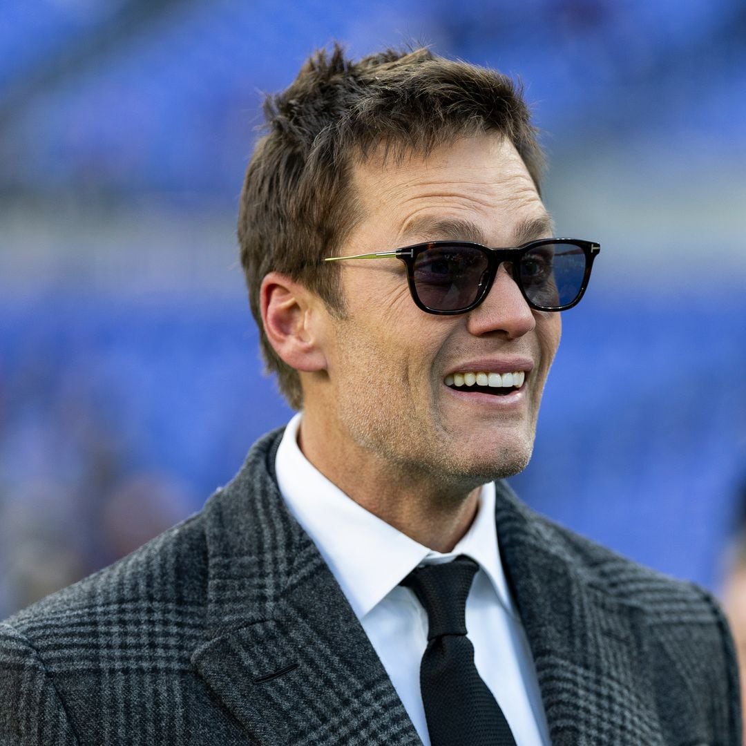 Tom Brady rocks out with his lookalike, and very tall,  son Jack at Coachella