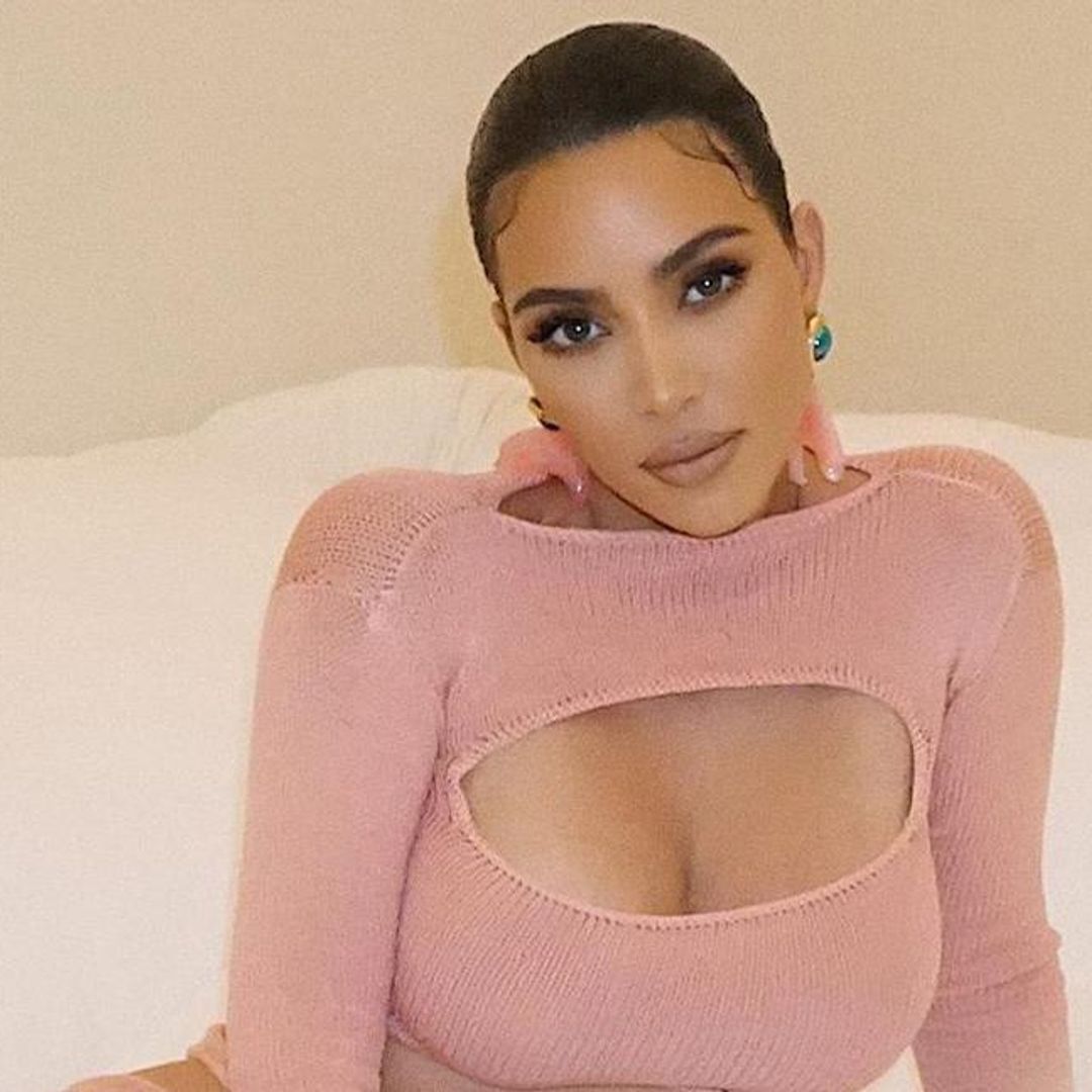 Kim Kardashian is smoking hot in a neon pink skimpy bikini while on a trip in Mexico