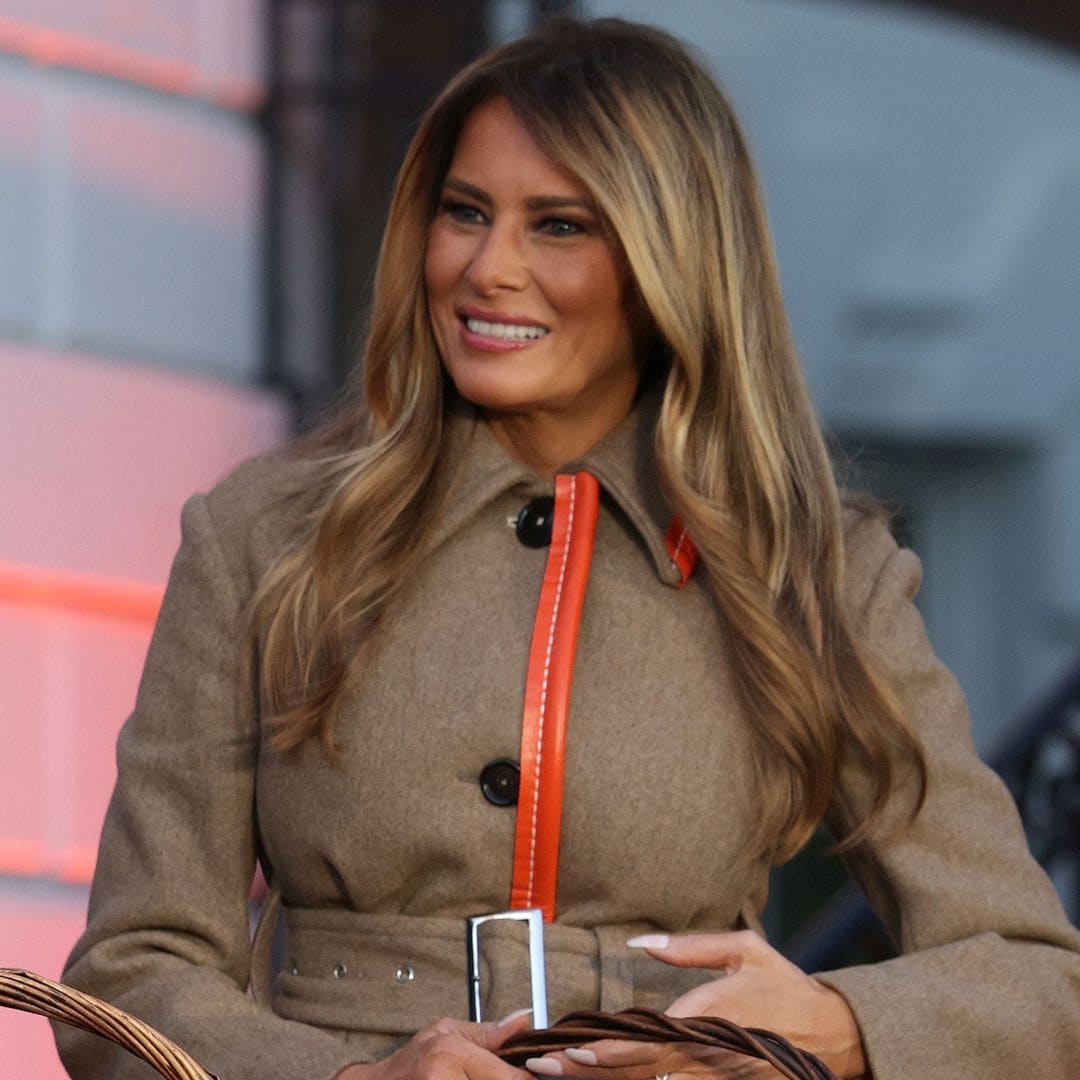 Melania Trump’s chic coat steals the spotlight at Halloween candy giveaway