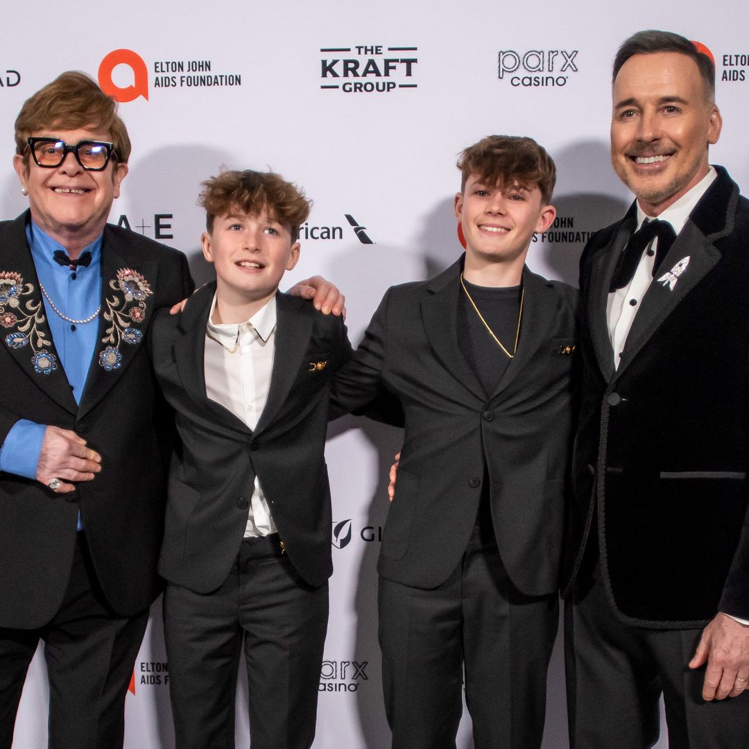 Elton John’s sons Zachary and Elijah make rare public appearance with famous dad for New Year’s Eve