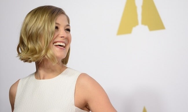 Rosamund Pike is a vision in white at Oscars Nominee Luncheon 