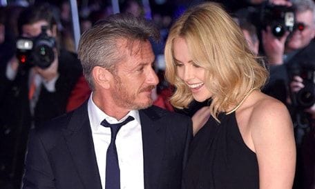 Sean Penn only has eyes for Charlize Theron at U.K. premiere of The Gunman