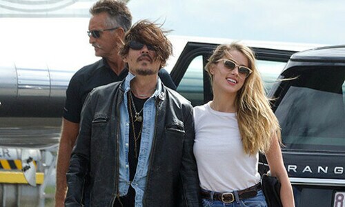 Amber Heard reunites with Johnny Depp in Australia ahead of 29th birthday
