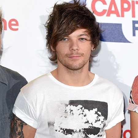 Louis Tomlinson responds to report gay sex rumors broke up One Direction