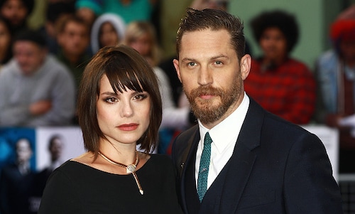 Tom Hardy's wife Charlotte Riley debuts baby bump on red carpet