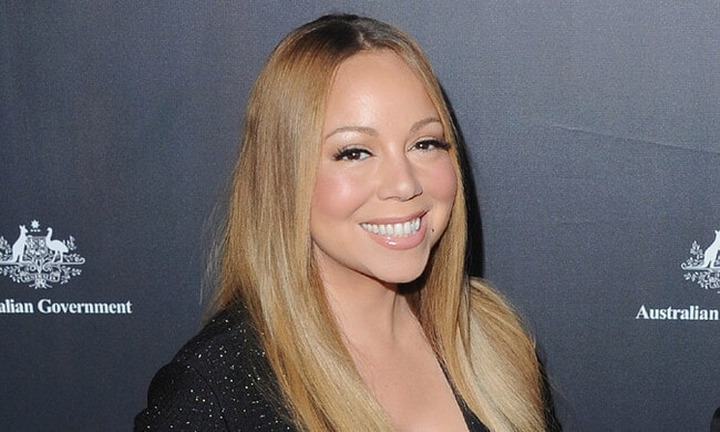 Mariah Carey flashes her amazing engagement ring on the red carpet