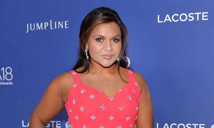 Mindy Kaling shows her Spanx before the 2016 Costume Designers Guild Awards
