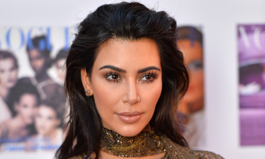 Kim Kardashian robbed at gunpoint in Paris, reunites with Kanye West stateside