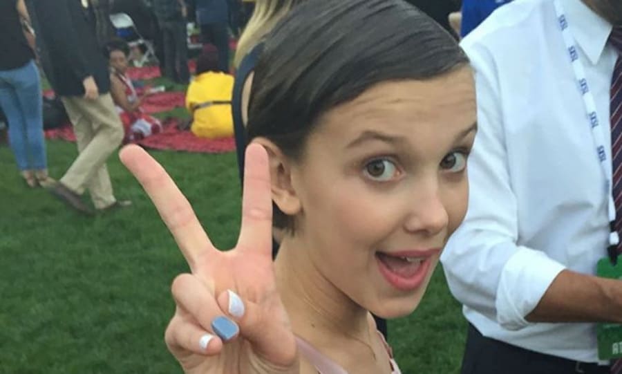 Millie Bobby Brown talks her 'strange' first kiss and which &apos...