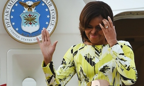 Michelle Obama makes a colorful fashion statement in Japan