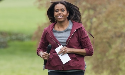 Michelle Obama shows off her toned arms in intense workout video