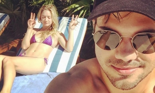 Billie Lourd jets away for a 'peaceful' vacation with Taylor Lautner after family deaths