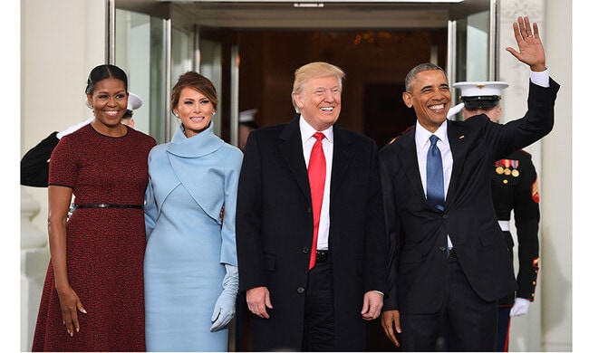 Barack and Michelle Obama greet Donald and Melania Trump for White House handover
