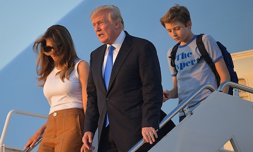 Melania Trump and son Barron move into the White House