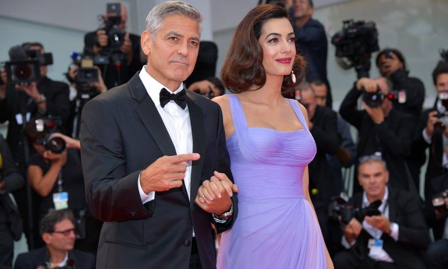 George and Amal Clooney step out for first red carpet since welcoming twins in Venice