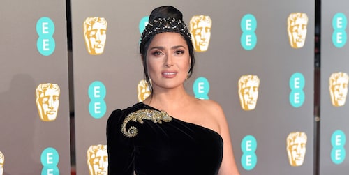Salma Hayek gets photobombed by this famous director during the BAFTAs