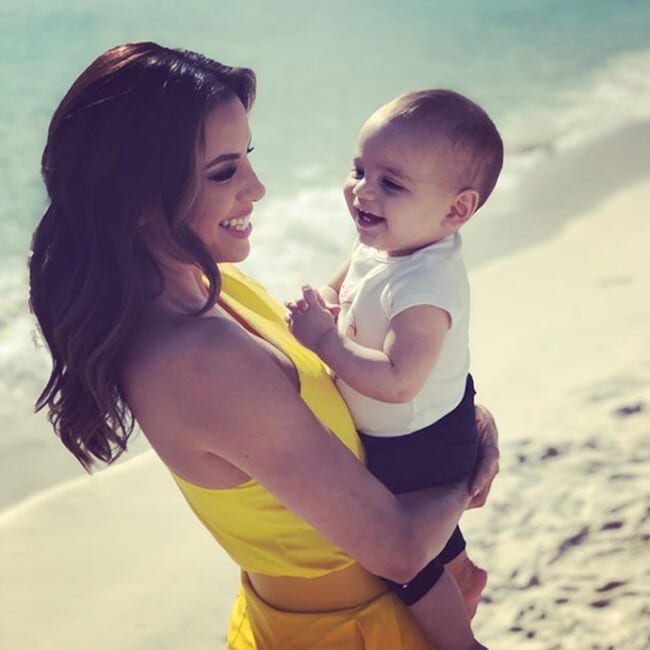 Eva Longoria takes baby Santi to the Cannes beach – but look how much he hates the sand!